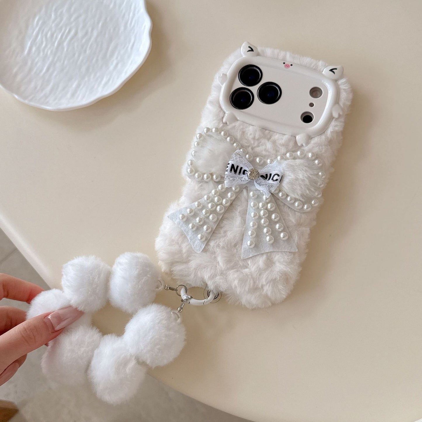 iPhone Soft Fur Back Cover with Pearl Bow & Pom-Pom Strap