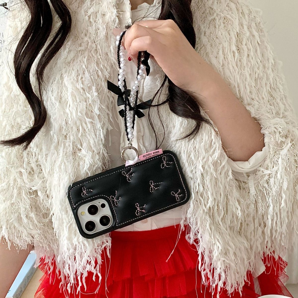 Black Back Cover with Bow Stitch Design and Beaded Strap for iPhone