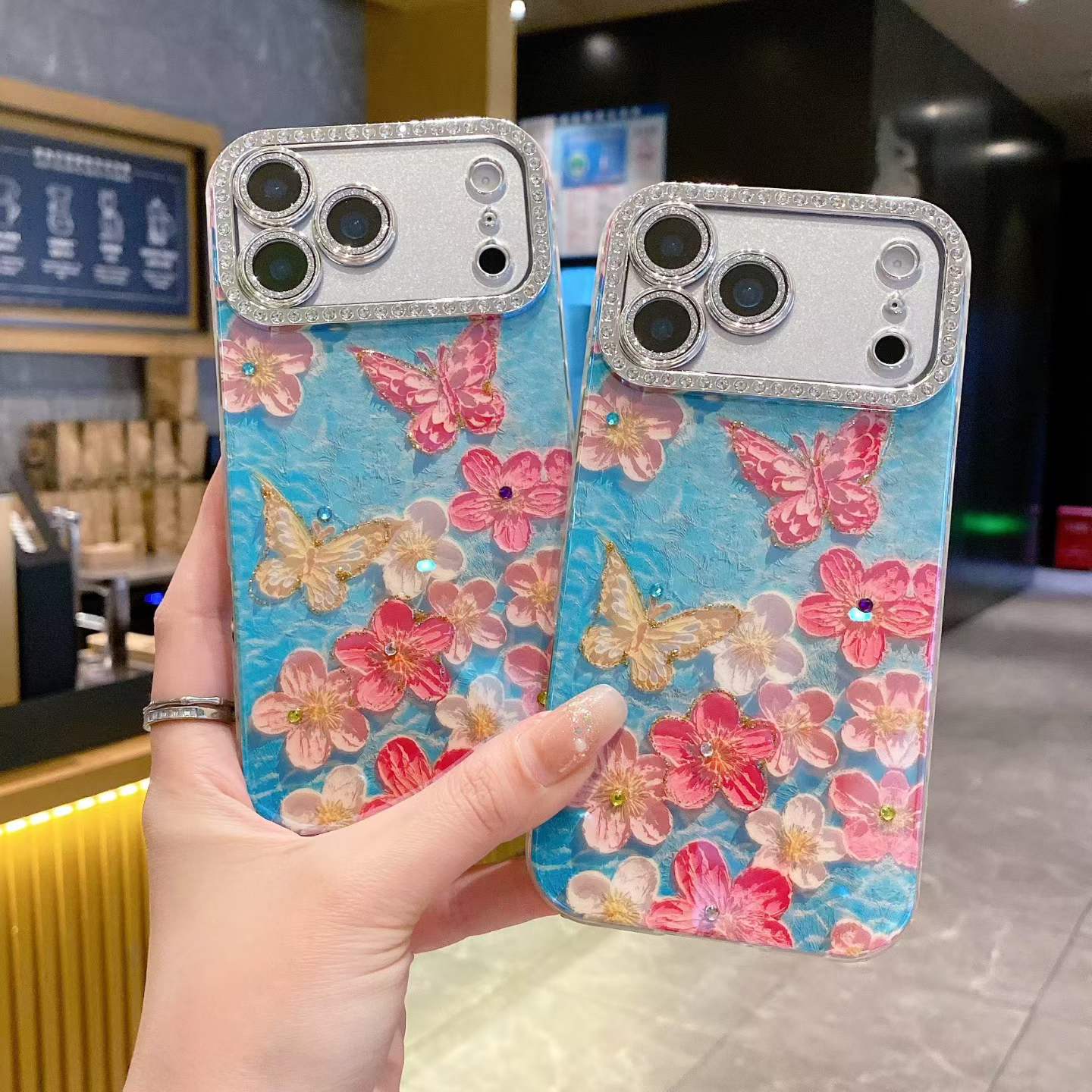 Blue Floral Butterfly Rhinestone iPhone Case – Luxury Crystal Camera Frame Cover